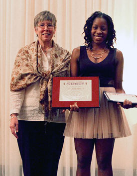Katie Sheahan, director of Recreation and Athletics, with Kaylah Barrett, Athlete of the Year. | Photo by Brianna Thicke