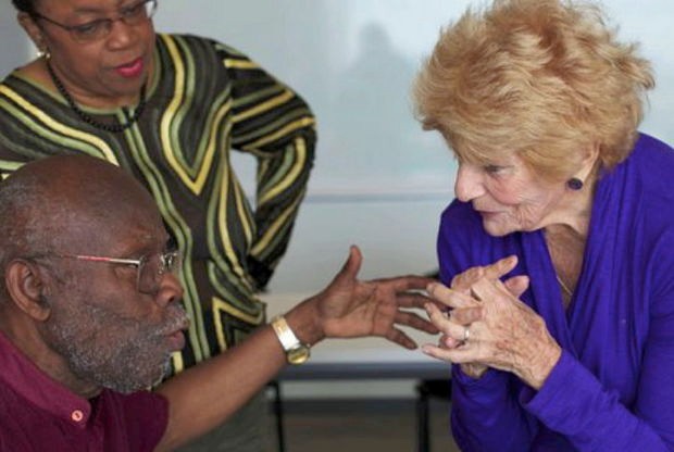 Geraldine Doucet, right, with Clarence Bayne, left. Geraldine Doucet, right, with Clarence Bayne, left.