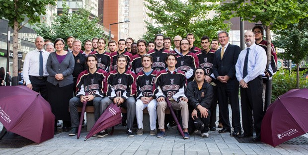 Senior administrators and the men’s hockey team on October 1, the day of the March of 1,000 Umbrellas. Concordia’s Centraide campaign kicks off October 14.