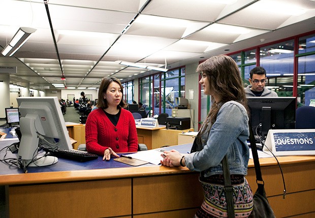 Reference assistants like Boi May Ang answer more than 100 questions from students each day.