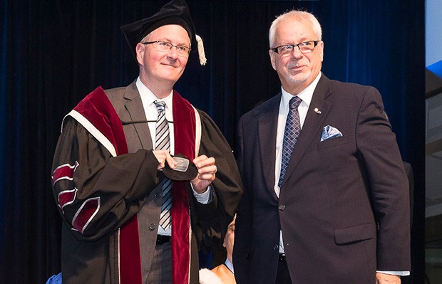 Concordia President Alan Shepard with Pierre-Marc Johnson, chair of the board of the Centre Jacques Cartier