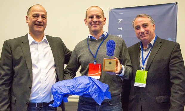 Kevin Little (centre), the PERFORM Centre’s Chief Administrative Officer, accepts the Best in Marketplace Award at INTERFACE 201 from  Michael Bidu (right) CEO of Sanotron and Executive Producer of INTERFACE 2014 and Brian Krieger (left), Executive Director, Export Development, British Colombia Ministry of International Trade.