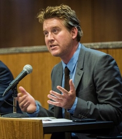 Kyle Matthews, senior deputy director of the Will to Intervene Project at the Montreal Institute for Genocide and Human Rights Studies (MIGS), addresses the crowd at the first Raoul Wallenberg Legacy event in New York City