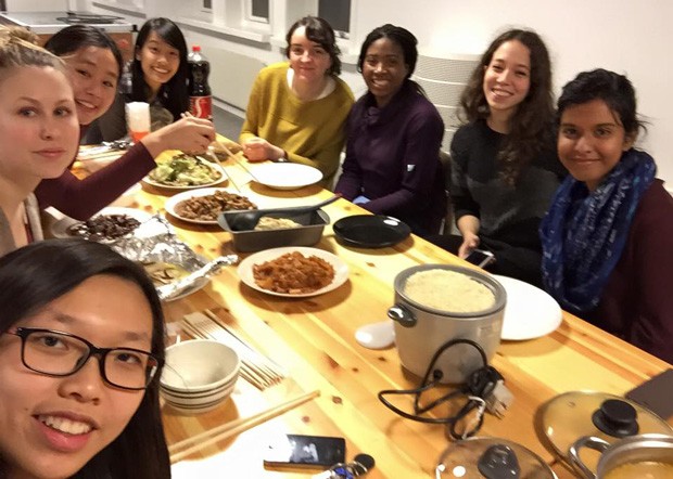 Exchange student Meagan Boisse (top left) managed to pull herself out of bed long enough to attend a Chinese New Year's celebration with some new friends.