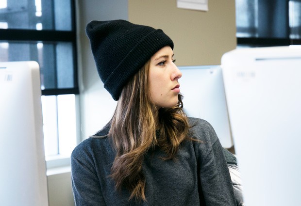 Emilee Gilpin listens to her peers discuss fake news.