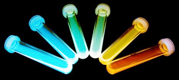 Pictured are test tubes containing carbon dots (light-emitting luminescent nanoparticles) with optical emission spanning blue to red. | Image courtesy of Rafik Naccache.