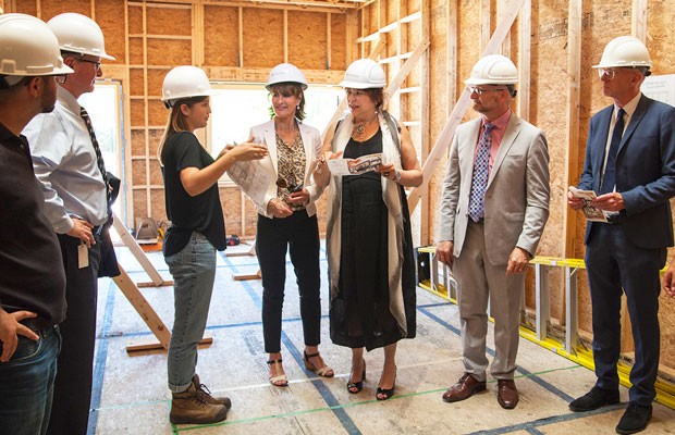 Following the announcement, government representatives toured the Solar Decathlon project site on Loyola campus. 