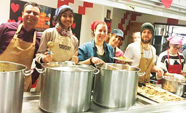 Afroza Khanam Chowdhury (second from left) volunteers at the People's Potato.