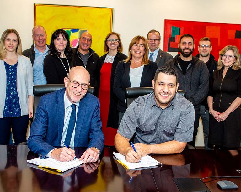 Concordia trades people on the Sir George Williams Campus sign a new agreement with the university