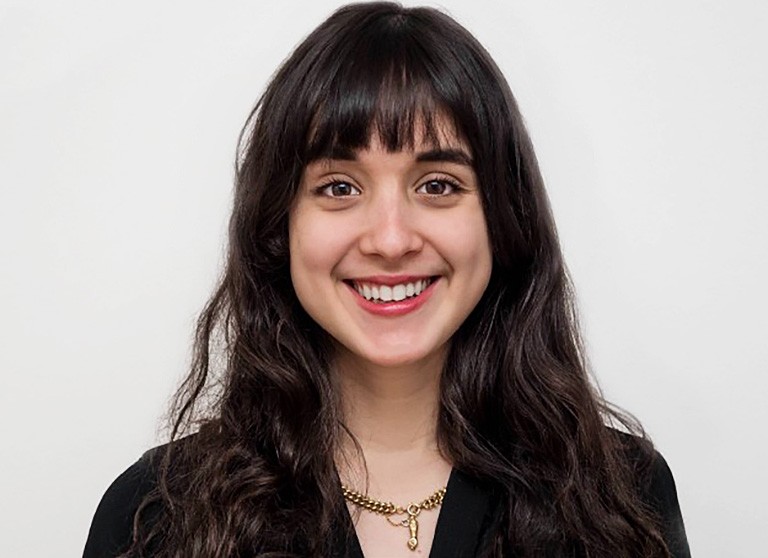 Wanda Stamford Steiner: “The atmosphere is great and it has been possible to feel a sense of bonding.” A smiling young woman with long brown hair, brown eyes and a black shirt in front of a pale background