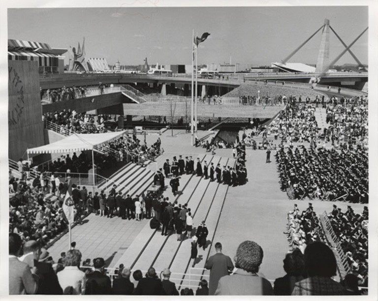 Black and white archive image from 1967 of a university convocation held outdoors.