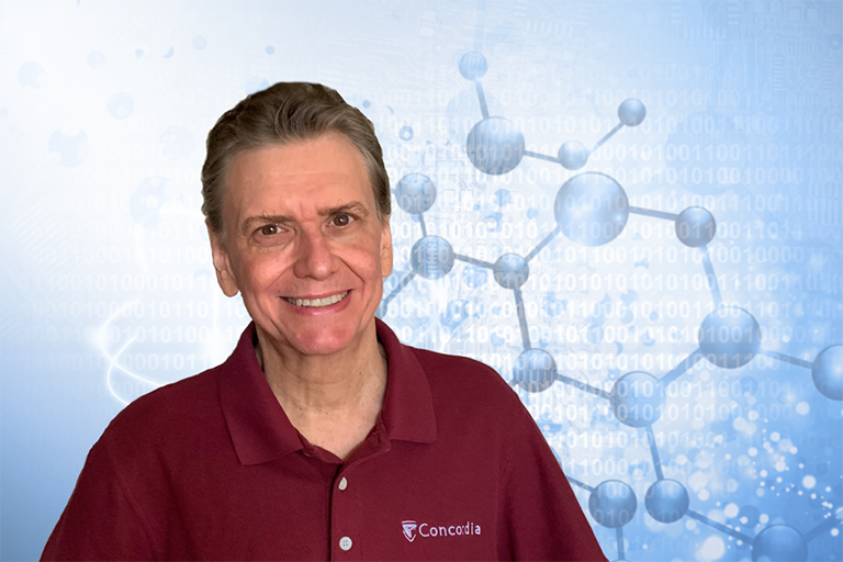 Gilles Peslherbe: “I feel honoured — and humbled — to have my name added to the distinguished list of Fellows.” Smiling middle-aged man with short light-brown hair and a burgundy polo with Concordia logo.