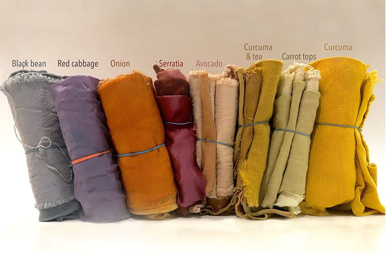 Rolls of different coloured cloth.