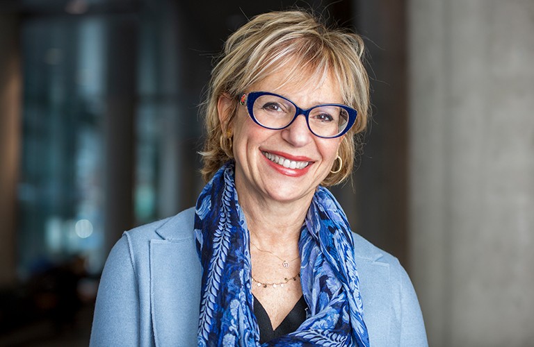 Cherine Zananiri: “I’m thrilled to be back at Concordia and taking on this exciting new challenge.” | © Concordia University, photo by Lisa Graves Pictured: Smiling woman with shortish blonde hair, glasses, a silk scarf and a blue shirt and jacket.