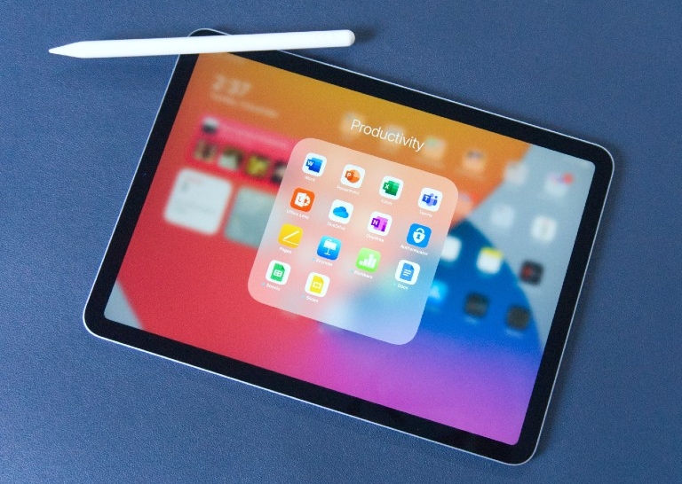 ipad by Sanjeev Mohindra via Unsplash ipad on blue surface