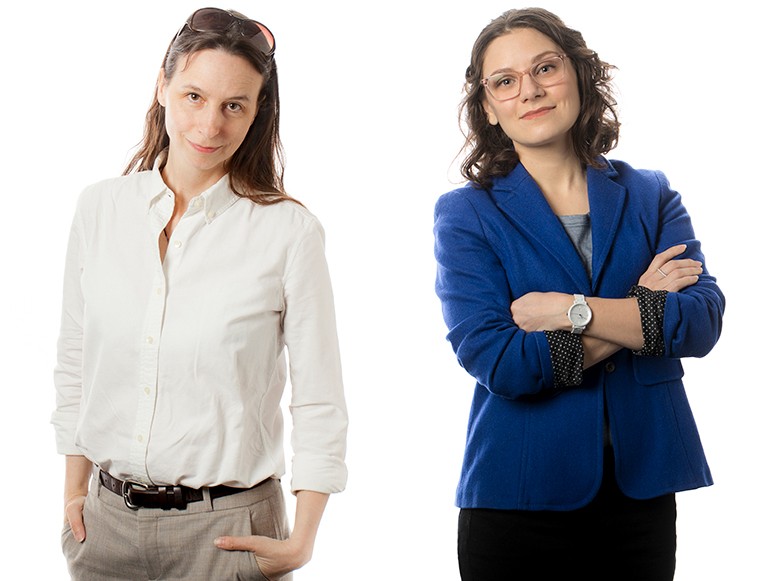 Rebecca Tittler and Alice Isac | Photos by David Ward Two women standing side by side, both with long dark hair.