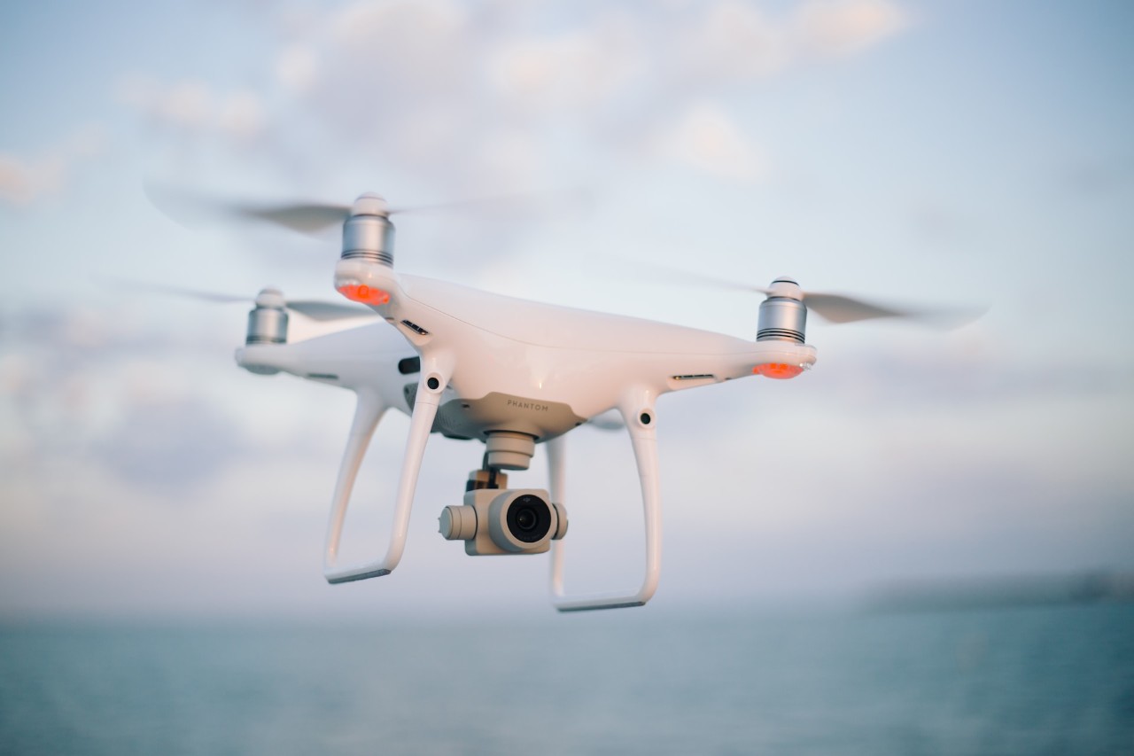 Photo: Josh Sorensen from Unsplash A small electric drone flying in the sky
