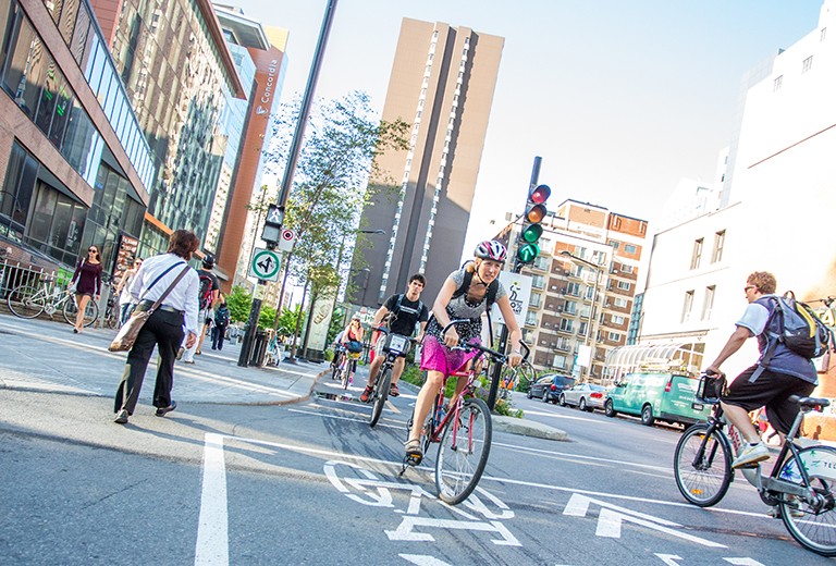 City cyclists on a busy city street.