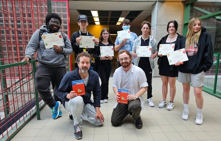 Top row from left: Tafari Promesse-Samuels, Aiden Vaillant, Isis Redmond, Jacob Magera, Aaron Gourarii, Canela Vierick LaPaix, Tiana-Jade Valliant. Bottom row from left: Colin Throness, Curtis John McRae | Photo by Marie-Laure Mahood A group of students holding award certificates with two teachers