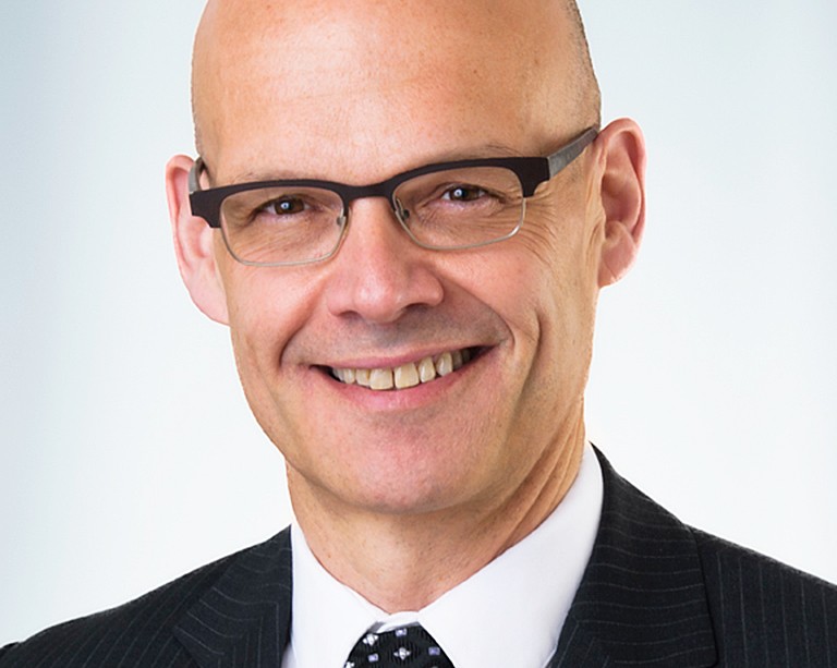 White male posing for a headshot 