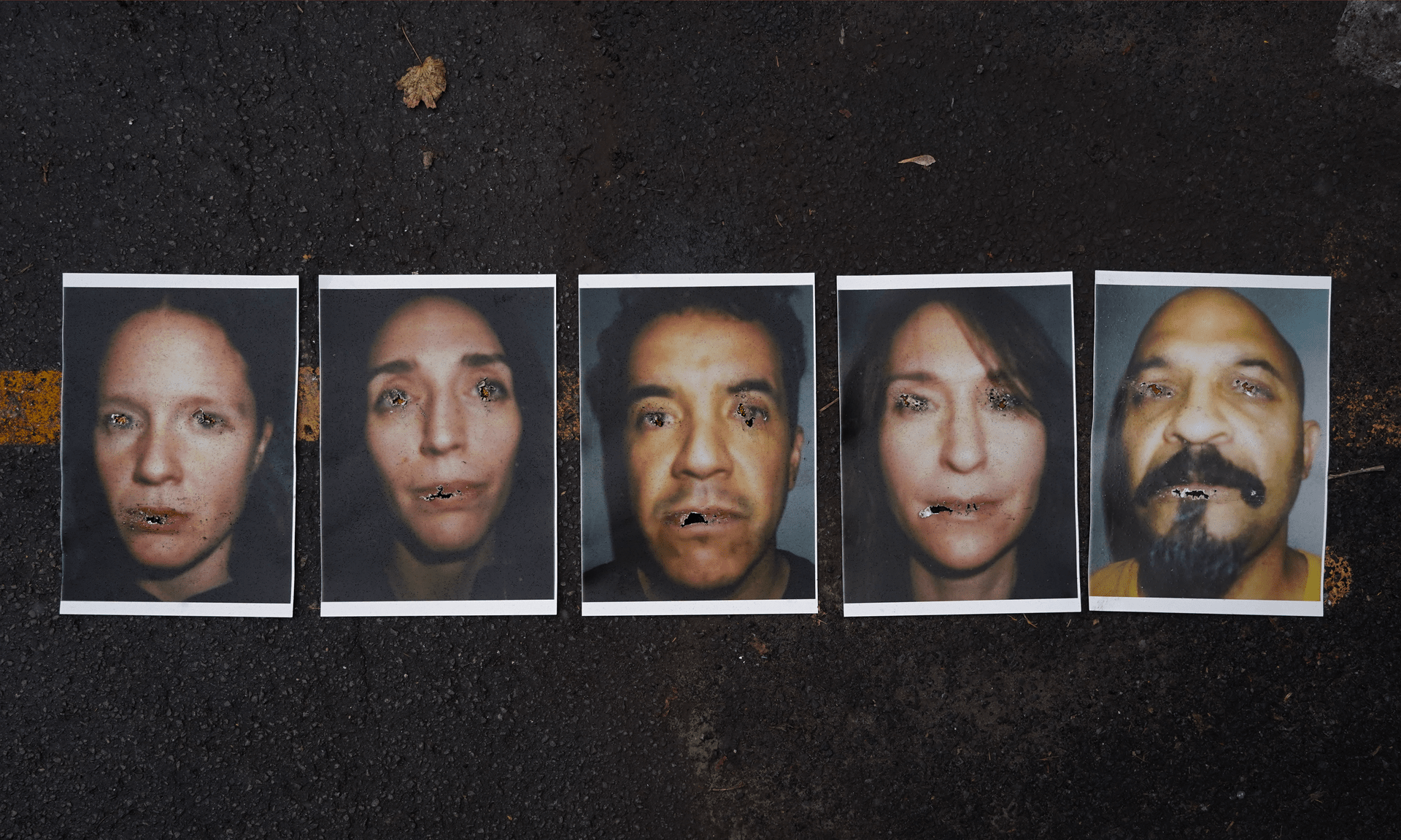 Headshot of 5 people with black background