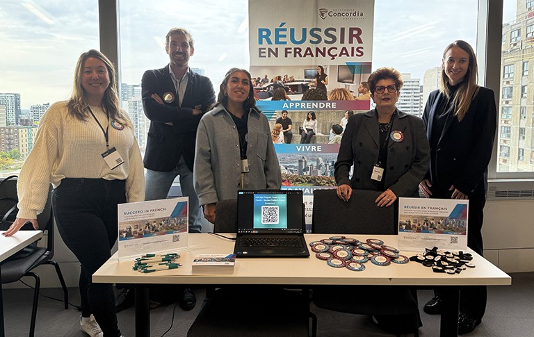 From left to right: Sarah Brisebois-Kirk (Project Coordinator, Réussir en français), Victor Jacquet (Deputy CEO, Volt-Age), Meera Nehme (Communications Advisor, University Communications Services / Réussir en français), Maria Trigueiro (Manager, Réussir en français), Claudine Trahan (Senior Director, Strategy and Transformation, Réussir en français). Wide view of a large atrium, showing natural light coming from the windows