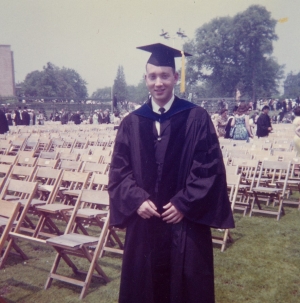 Vintage photo of Bruce Mallen in his graduation gown and hat