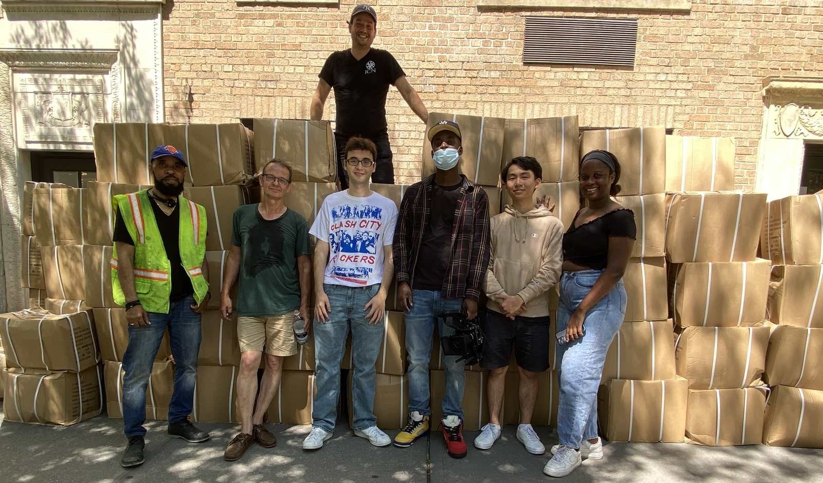 Russ Makofsky and volunteers bring boxes of chess sets to New York City