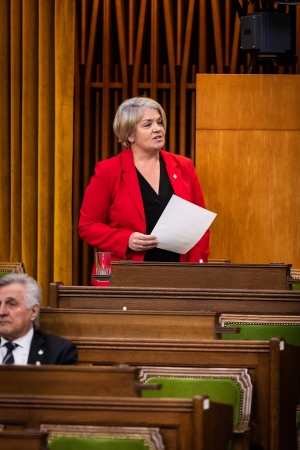 Sherry Romanado stands, speaking in the House of Commons