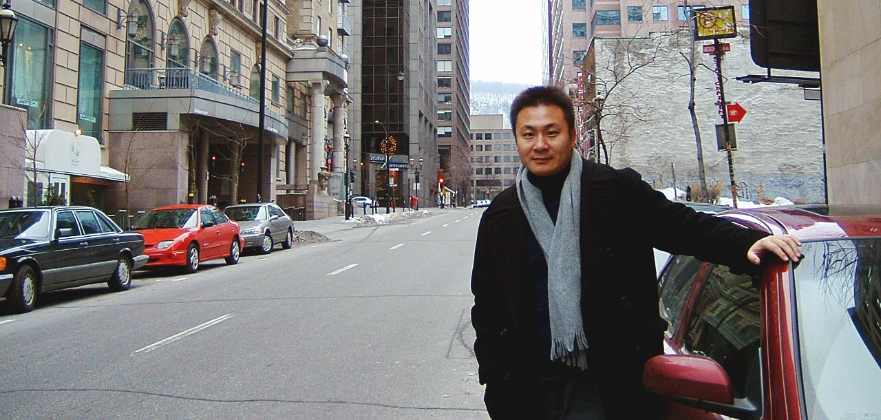 Warren Gang Tian, MBA 04, on a Montreal street.