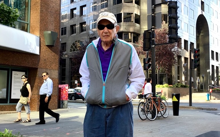 Mike Gutwillig standing on a street in downtown Montreal