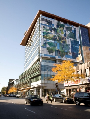 Glass building in front of a blue sky