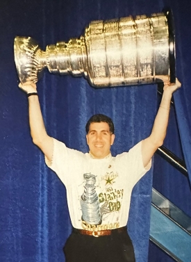Craig Button hoists the Stanley Cup over his head