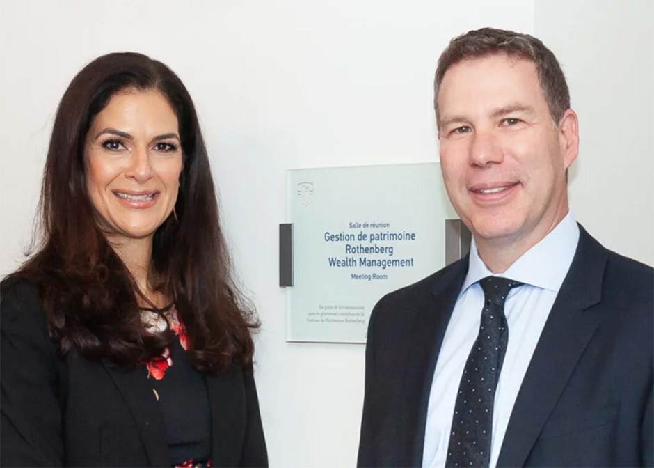 Maria Ioannou and Robert Rothenberg A woman with long dark hair and a man in a blue suit.