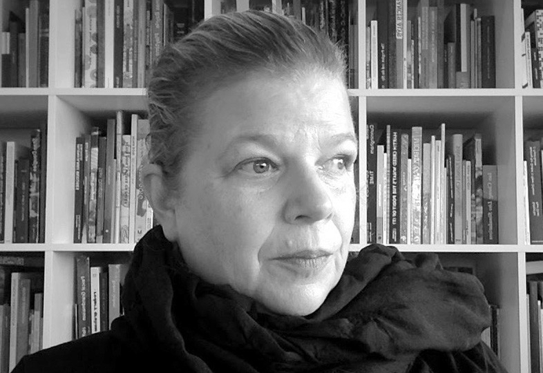 A black and white portrait of Kitty Scott