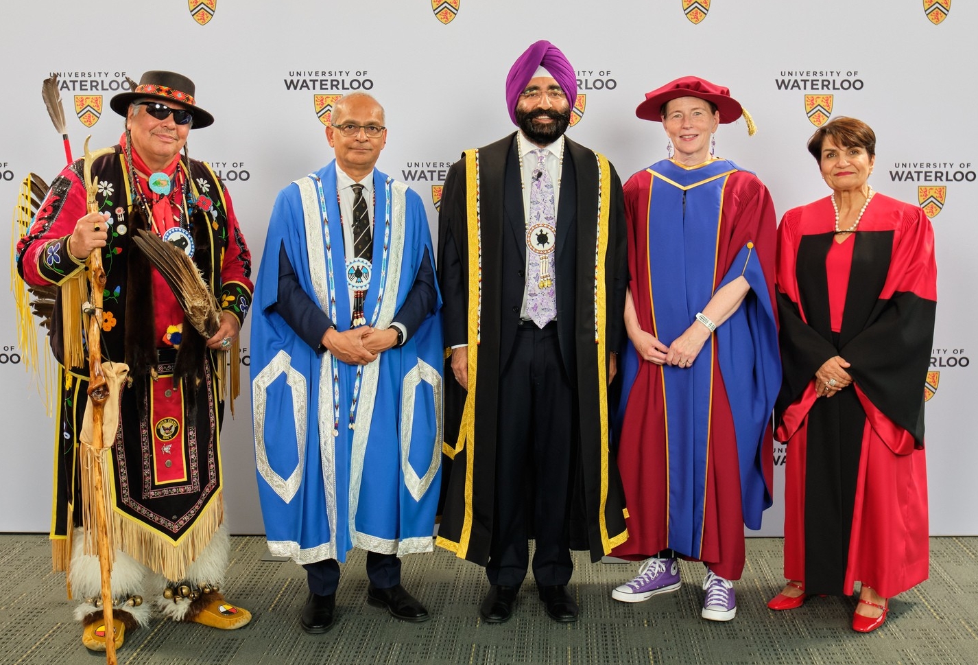 Gina Cody Gina Cody stands far right in a group of 5 people, all of whom are wearing University of Waterloo convocation gowns.
