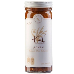 Tall glass jar with white label and lid