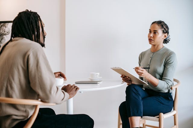 Woman interviews subject