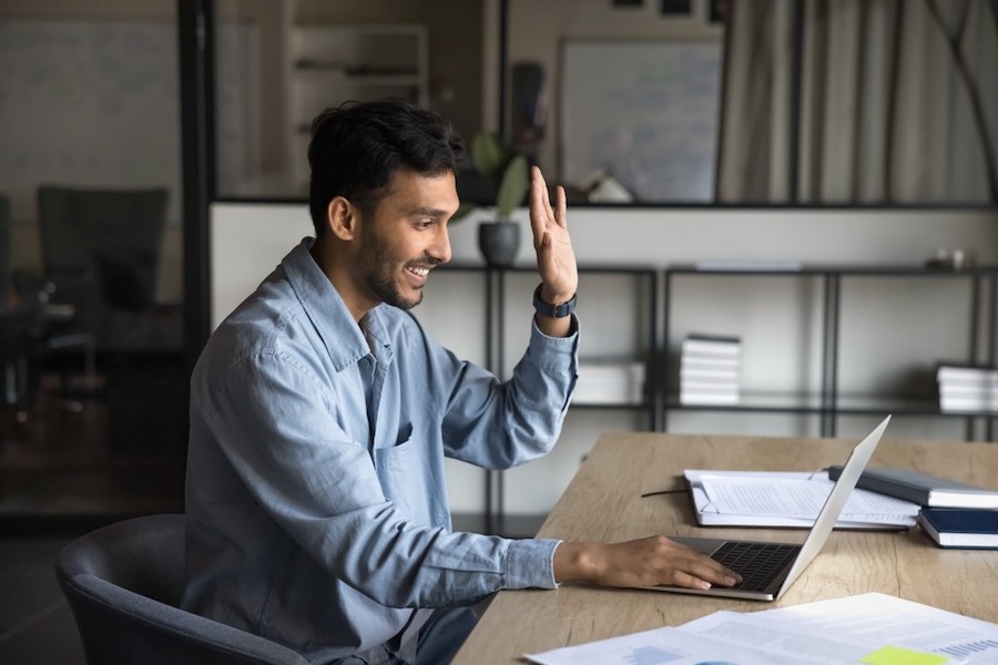 Man waves in virtual workshop