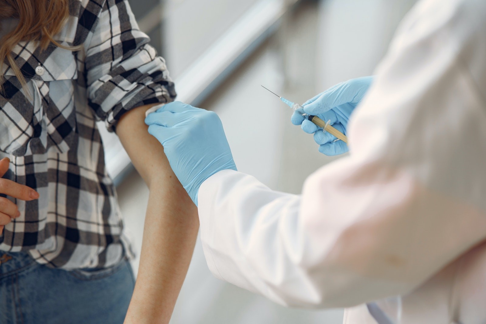 Nurse gives student vaccine