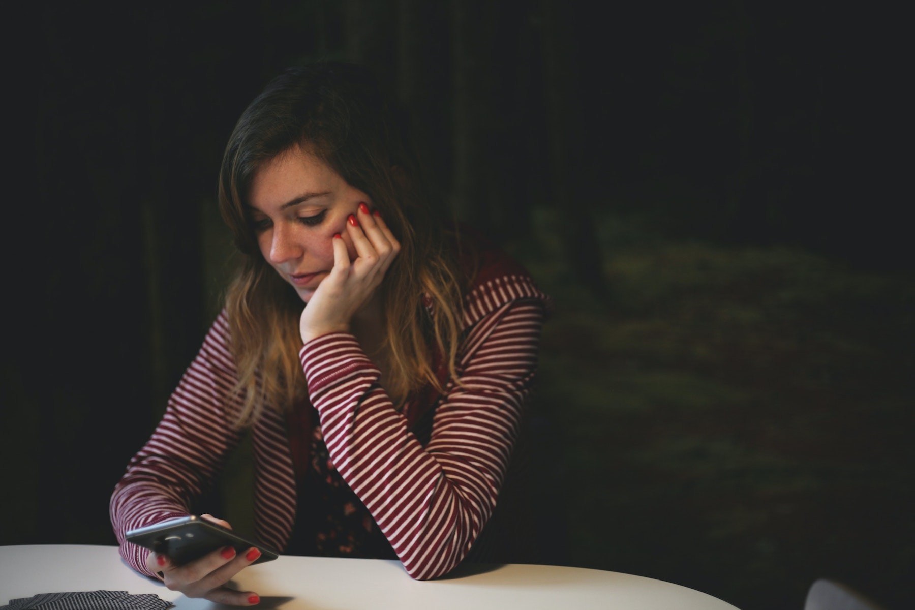 Photo by Kev Costello on Unsplash Person looking at their phone