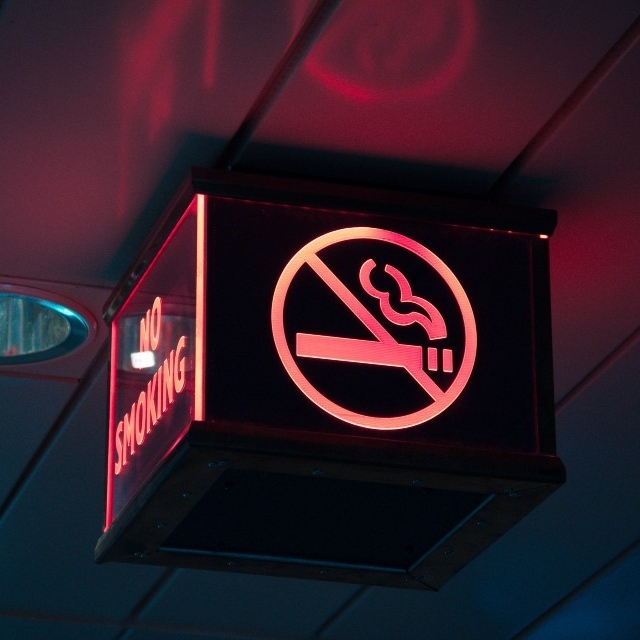 An illuminated "no smoking" sign