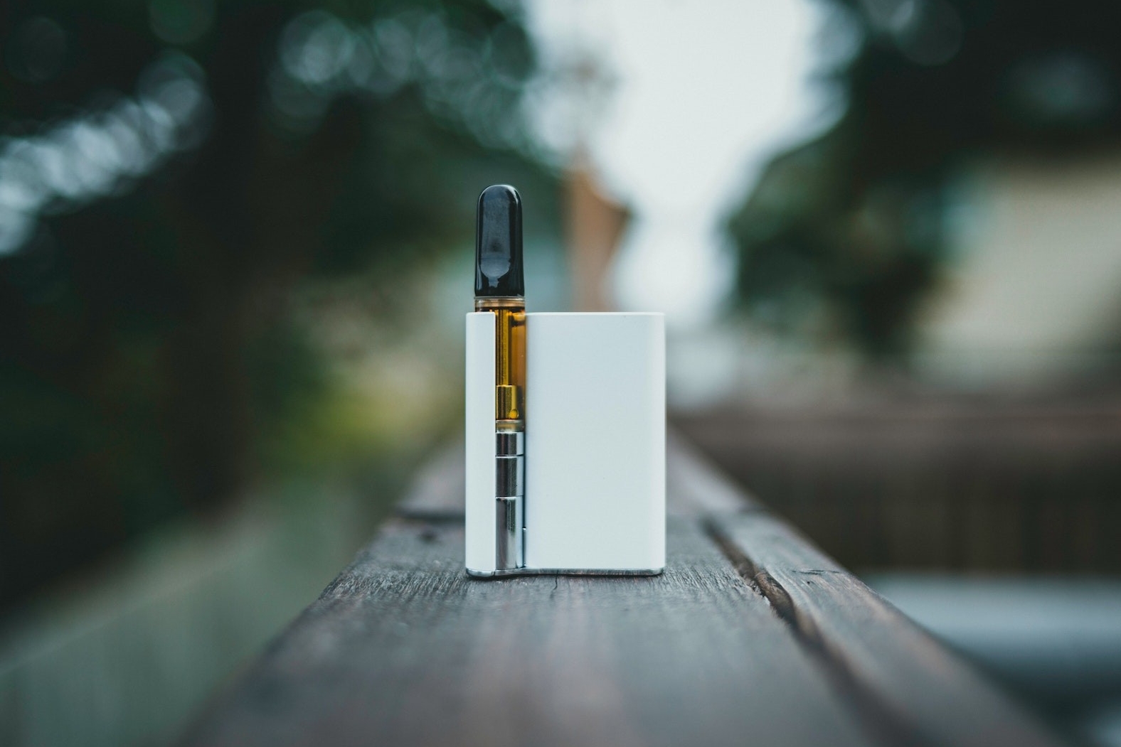 An e-cigarette sits on a table