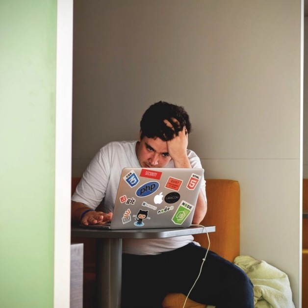 Stressed-out guy with laptop