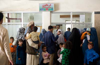 A crowded pharmacy counter in a Kabul hospital