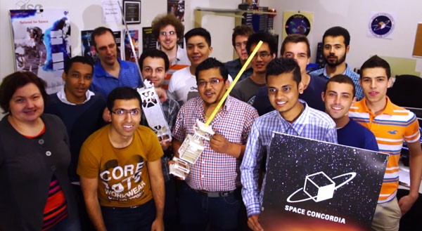 Team leader Mehdi Sabzalian (front row, second from left) with members of Space Concordia who are working on ConSat-2