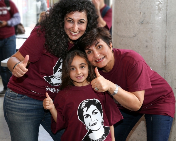 From left: Layla Benyakhlef, records management assistant, her daughter and Gina Cody
