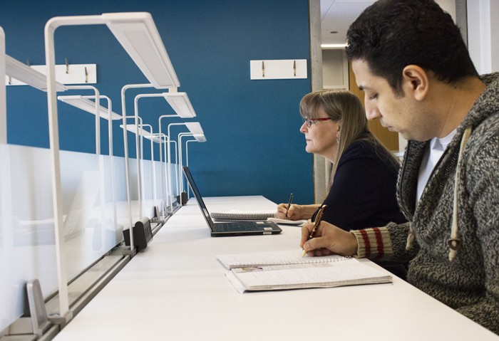 Students writing their thesis