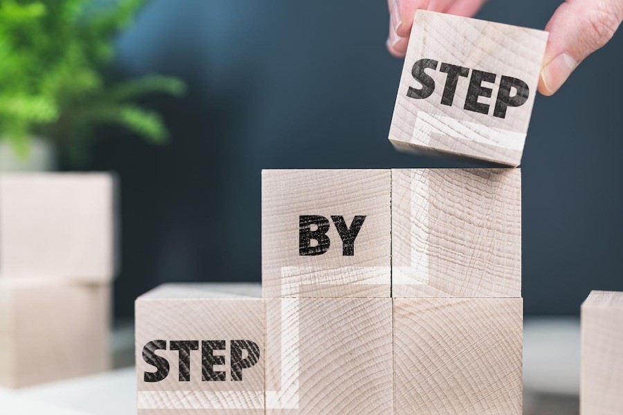 wooden cubes that read step by step