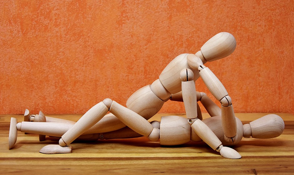 Two wooden figurines simulating sex